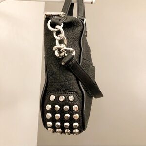 Michael Kors Genuine Leather Shoulder bag in black with silver-tone hardware.